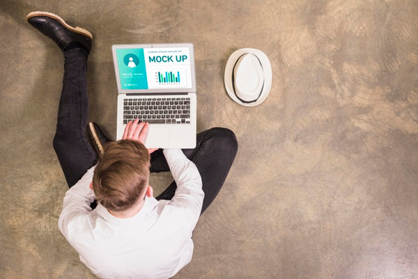 Free Top View Of Man Working On Laptop With Copy Space Psd