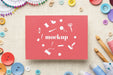 Free Top View Of Mock-Up Frame Design With Sewing Essentials Psd