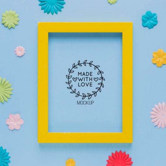 Free Top View Of Mock-Up Frame With With Colorful Paper Decorations Psd