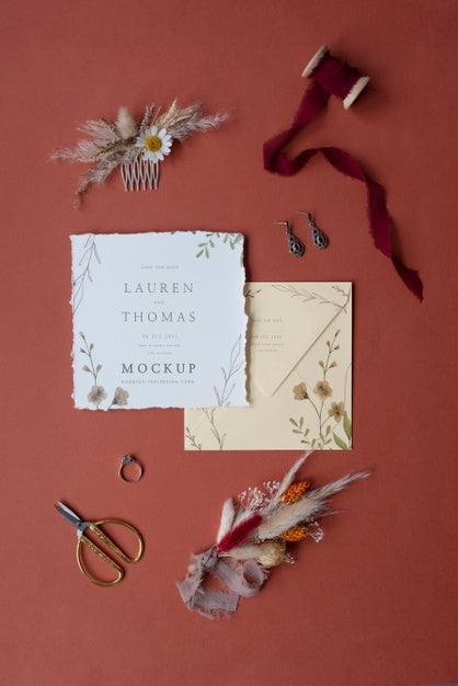 Free Top View Of Mock-Up Rustic Paper Wedding Invitation With Leaves And Flowers Psd