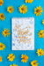 Free Top View Of Notebook And Flowers On Blue Background Psd