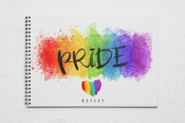 Free Top View Of Notebook With Rainbow Colors Psd