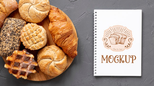 Free Top View Of Pastries With Notebook Psd
