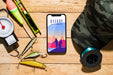 Free Top View Of Smartphone With Fishing Bait Psd