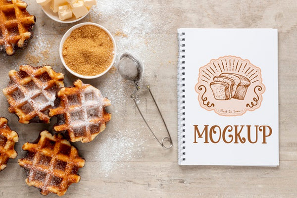 Free Top View Of Waffles With Notebook Psd