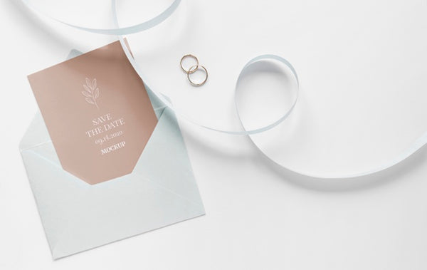 Free Top View Of Wedding Card With Ribbon And Envelope Psd