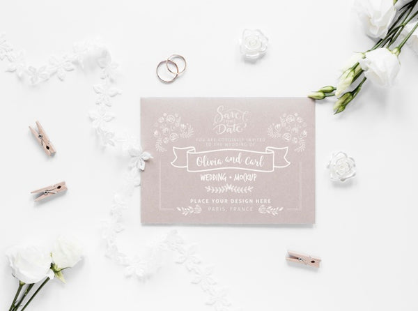 Free Top View Of Wedding Card With Roses And Clothing Pins Psd
