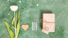 Free Top View Present With Tag And Flower Psd