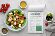 Free Top View Salad And Menu Arrangement Psd