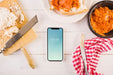 Free Traditional Spanish Food Mockup With Smartphone Psd