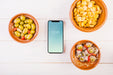 Free Traditional Spanish Food Mockup With Smartphone Psd