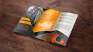 Free Trifold Brochure Mockup On Wooden Surface Psd