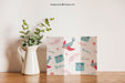 Free Trifold Paper Next To Flower Psd