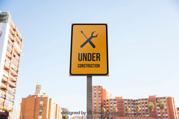 Free Under Construction Sign Mockup Psd