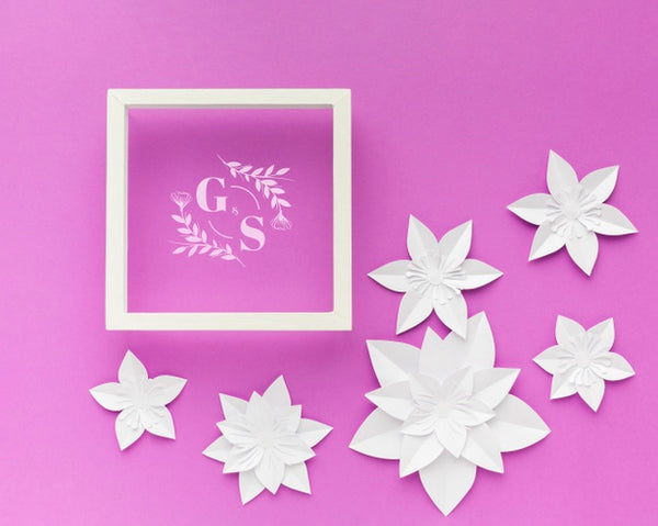 Free Wedding Frame With Paper Flowers On Purple Background Psd