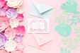 Free Wedding Invitation Mock-Up And Envelopes With Paper Flowers On Pink Background Psd