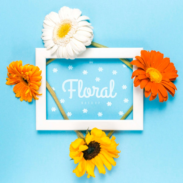 Free White Frame Mock-Up With Colorful Flowers Psd