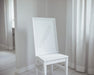 Free White Frame On Chair Mock Up Psd