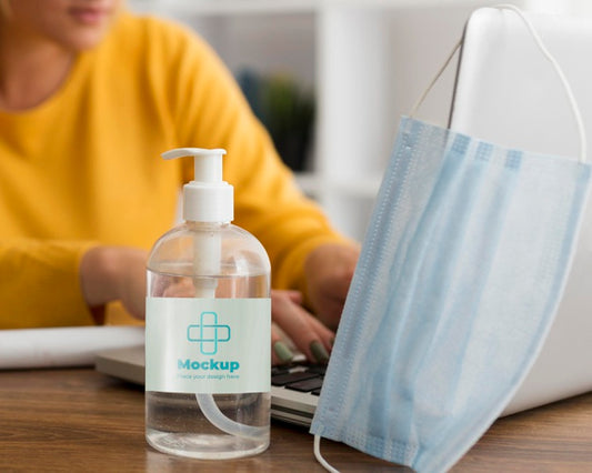 Free Woman At Desk With Mask And Disinfectant Mock-Up Psd