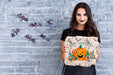 Free Woman Holding A Card With Carved Pumpkin For Halloween Psd