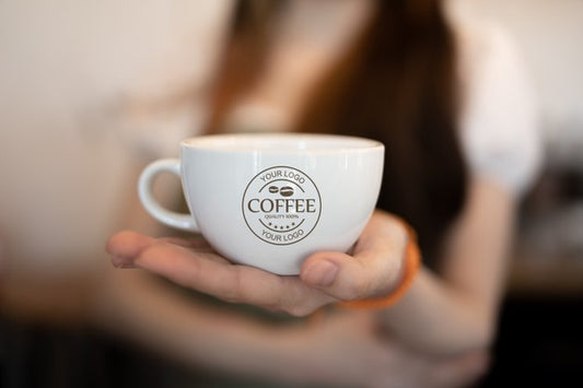 Free Woman Holding Coffee Mug Mockup Psd