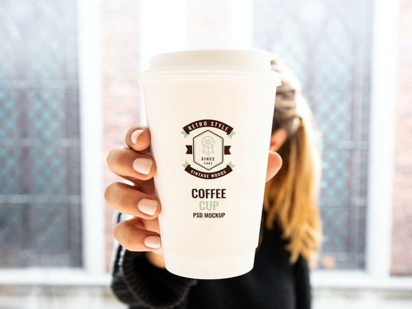 Free Woman Holding Cup Mockup