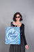 Free Woman Holding Shopping Bag Mockup With Black Friday Concept Psd