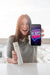 Free Woman Holding Smartphone Mockup With Black Friday Concept Psd
