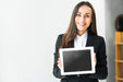 Free Woman Presenting Tablet Mockup Psd
