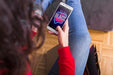 Free Woman Searching For Black Friday On Smartphone Psd