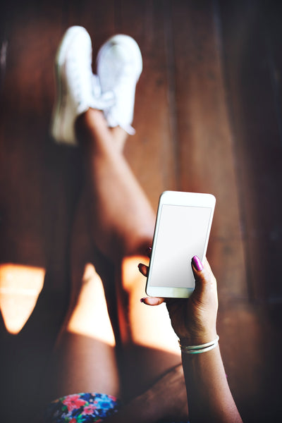 Free Woman Using A Smartphone With An Empty Screen