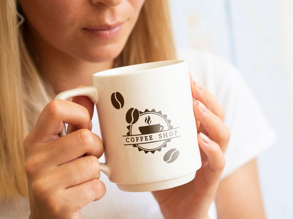Free Woman Wanting To Drink From A Coffee Mug Mock-Up Psd