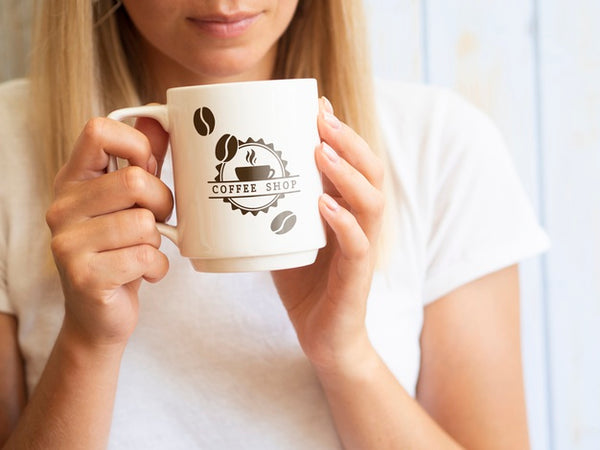 Free Woman Wanting To Drink From A Coffee Mug Psd