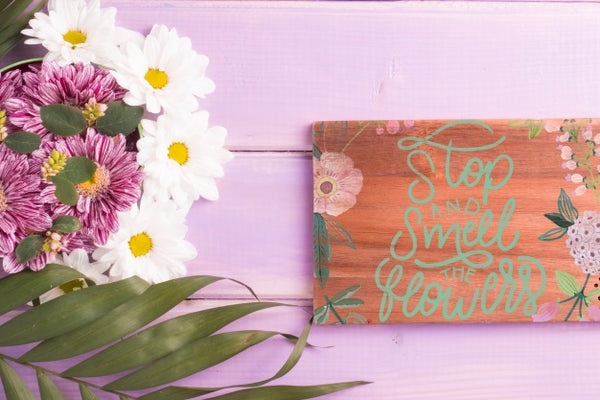Free Wooden Board Mockup With Floral Decoration Psd