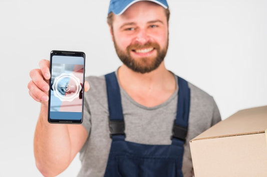 Free Worker Holding Smartphone Mockup For Labor Day Psd