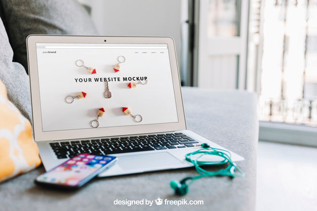Free Workspace Composition With Smartphone On Laptop Psd